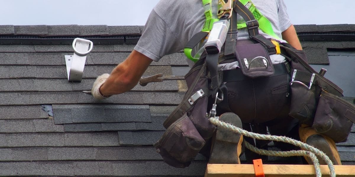 roofer-working-on-a-roof-replacement-project-in-akron-oh