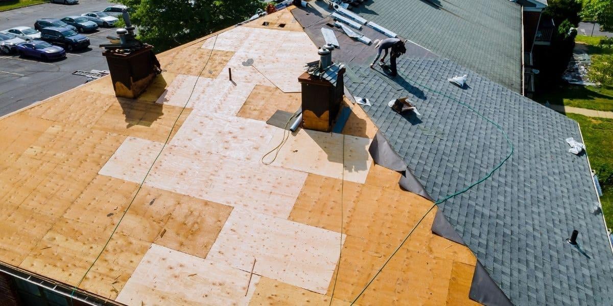 these-roof-repair-contractors-are-repairing-a-roof